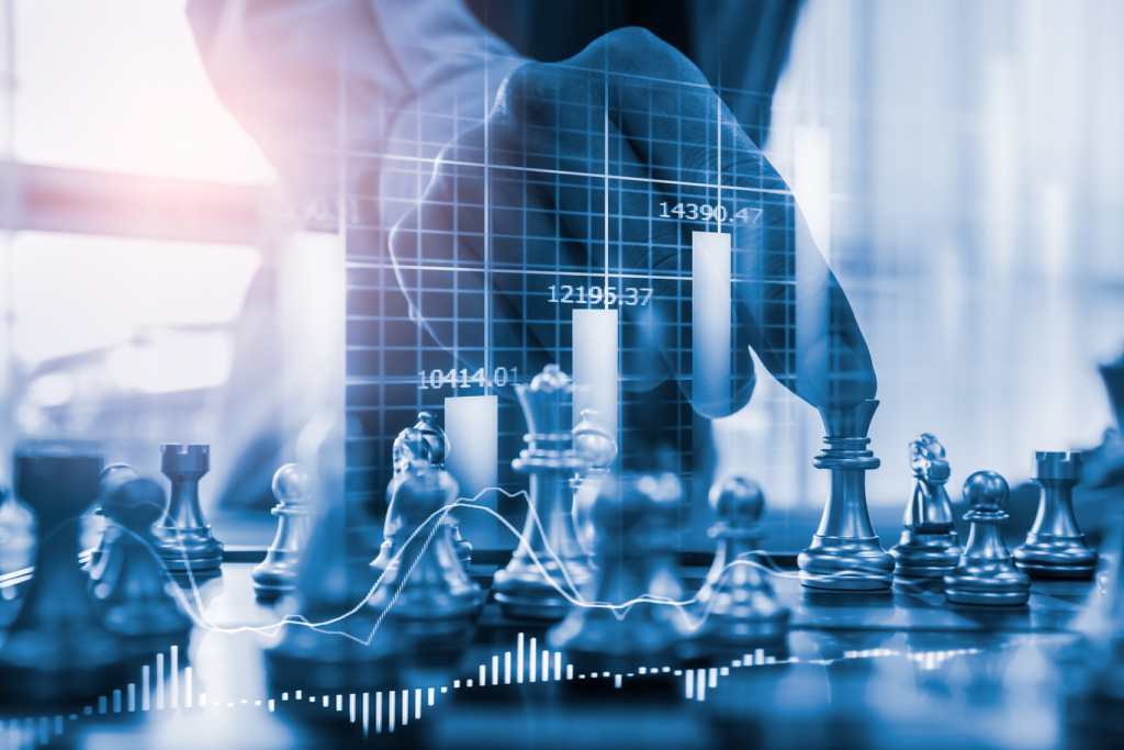 digital-composite-image-businessman-playing-chess-graphs-(1).jpg